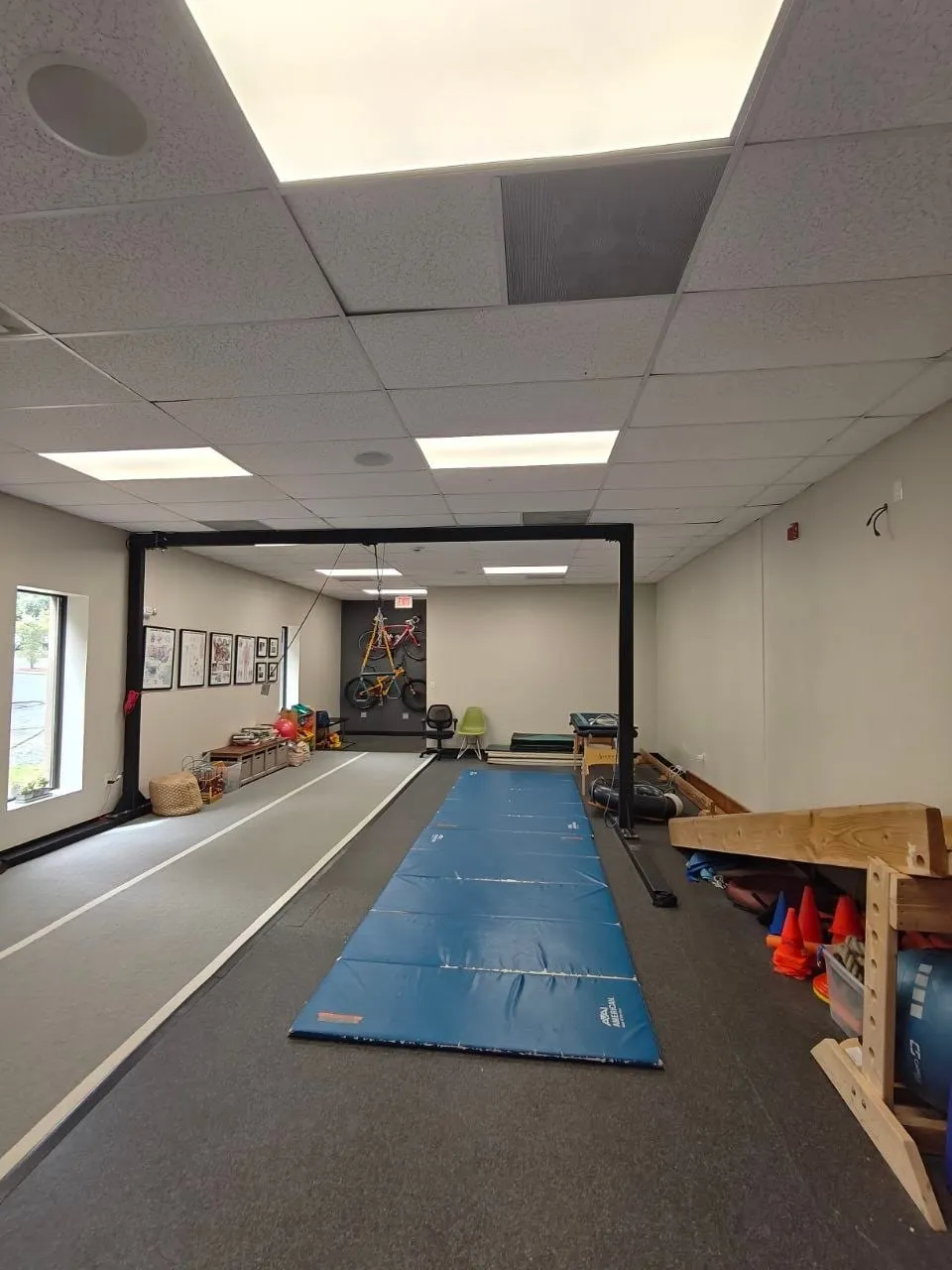 The NeuroDevelopmental Movement studio at Active Healing in Danvers, with floor mats, a movement runway and equipment